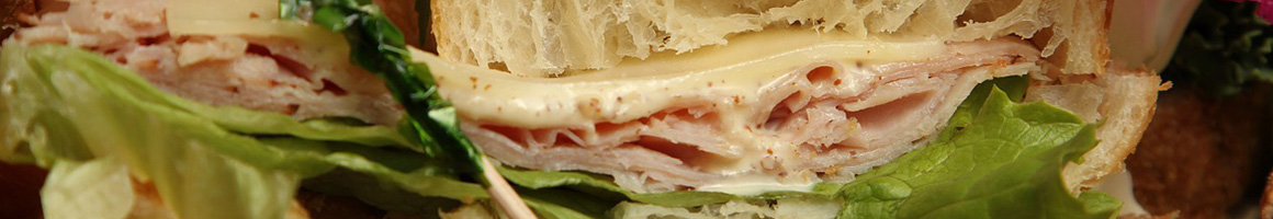 Eating Deli Sandwich at Meridian Food Market restaurant in Boston, MA.